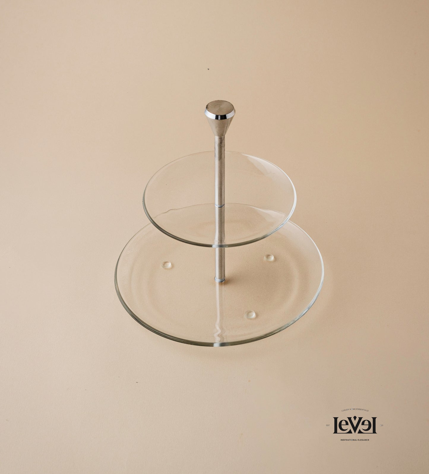 Two layer glass stand with silver handle